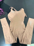 Beige MobbMall's compression one-piece activewear